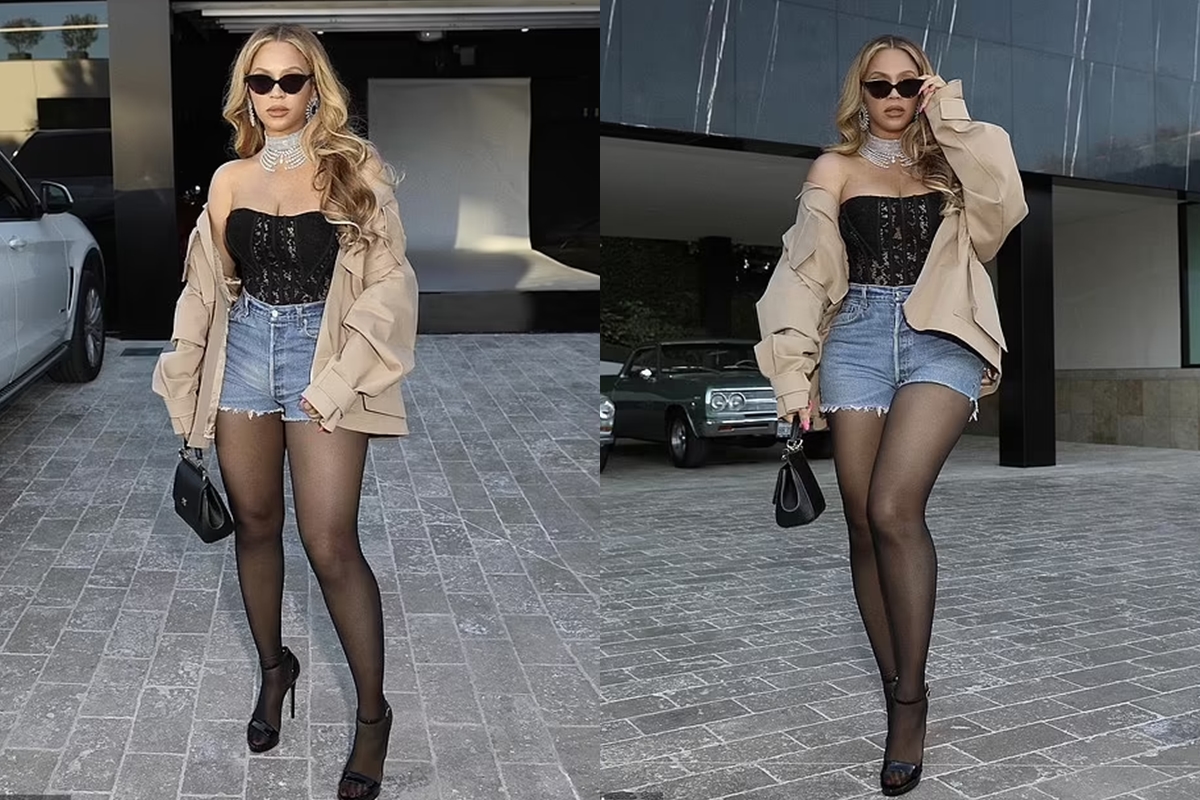 Beyonce puts on a VERY busty display in a black lace corset and tiny ...